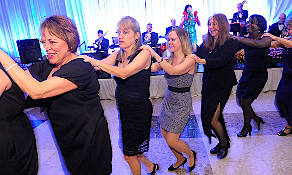 The ladies have a conga line (Peaches O'Dell and her Orchestra)