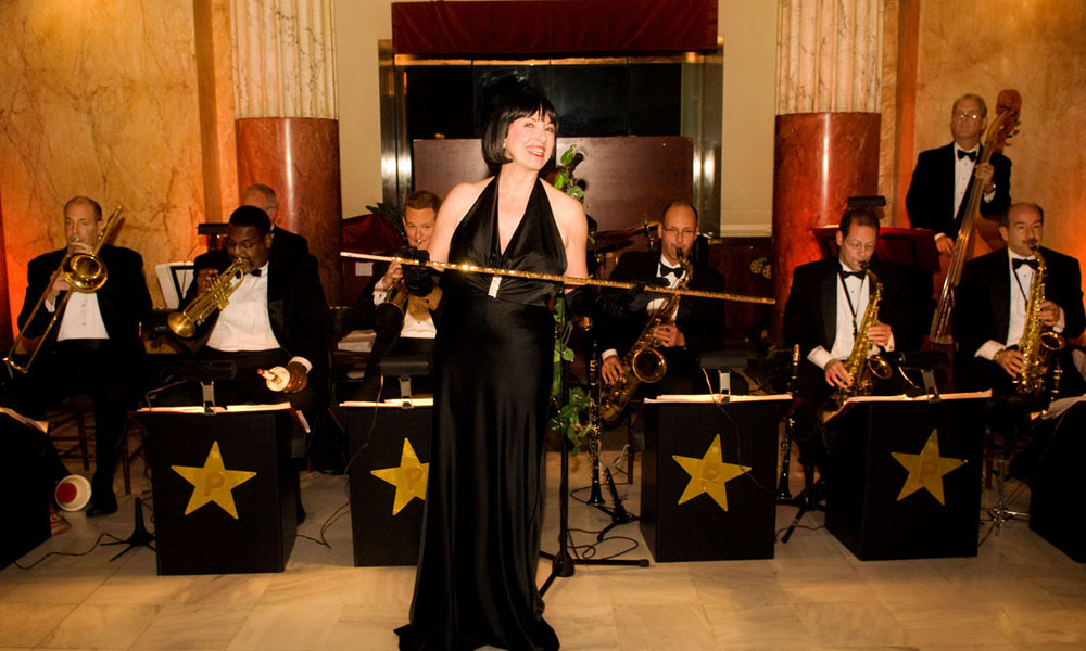 The band plays at a grand gala (Peaches O'Dell and her Orchestra)